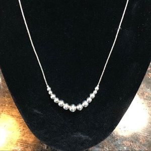 Sterling Silver necklace w/graduating size beads